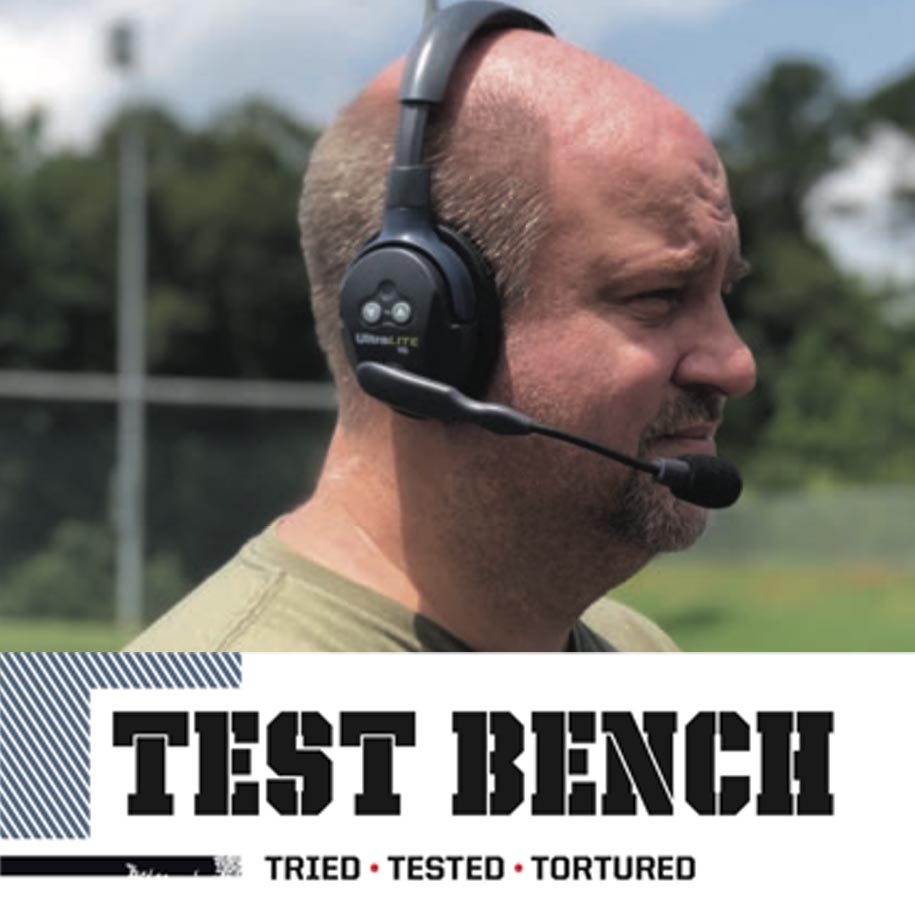 Testbench magazine man wearing ultralite headset.